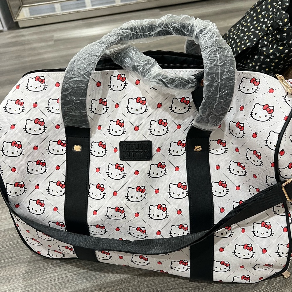Hello Kitty White and Black Travel Bag with Playful Design